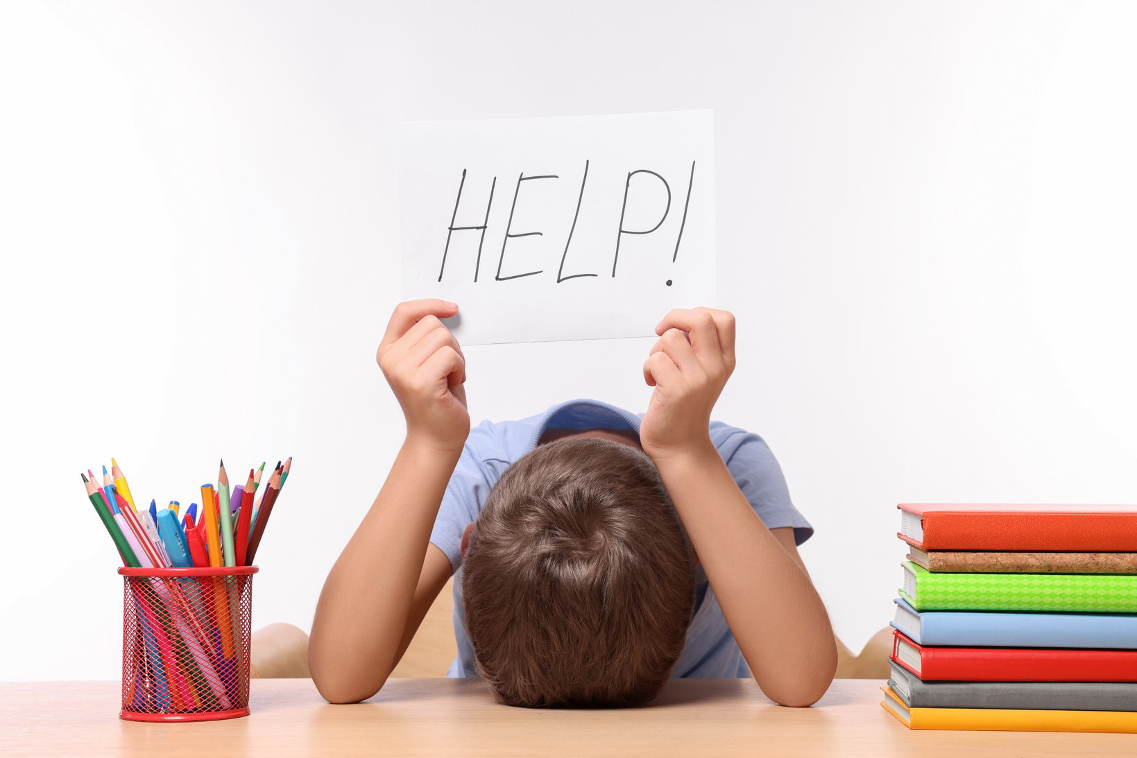 Dyslexia Concept. Little Boy Holding Paper with Word Help at Woo